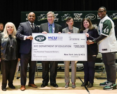 MMCU_NYJets_Check_Presentation_2_13_2018.png